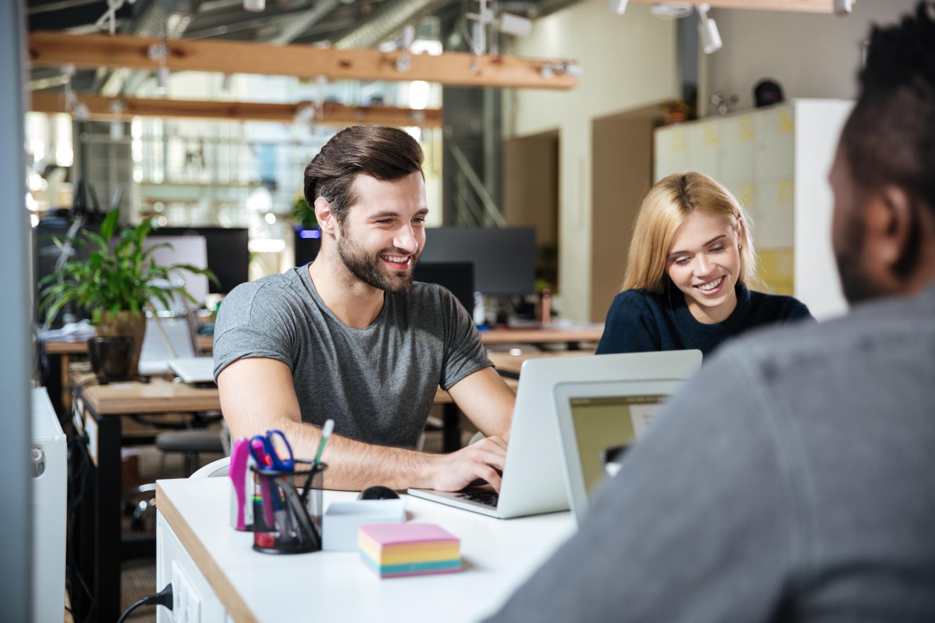 Smiling Young Colleagues Sitting Office Coworking